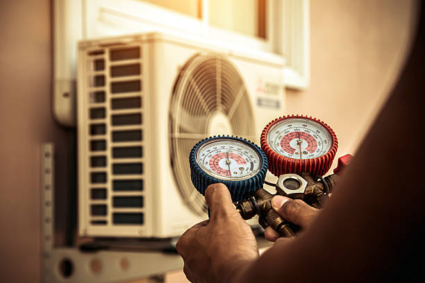 Professional Air Conditioning Service technician working in Broomfield, CO